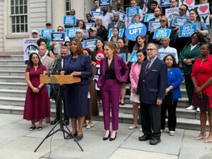 Asian American Federation CEO Catherine Chen joins City Council Speaker Julie Menin, New York Attorney General Letitia James and other members of the community at a rally at City Hall on Thursday, October 1, 2026.
